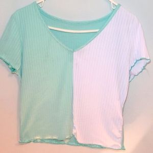 split color (teal/white) cropped top